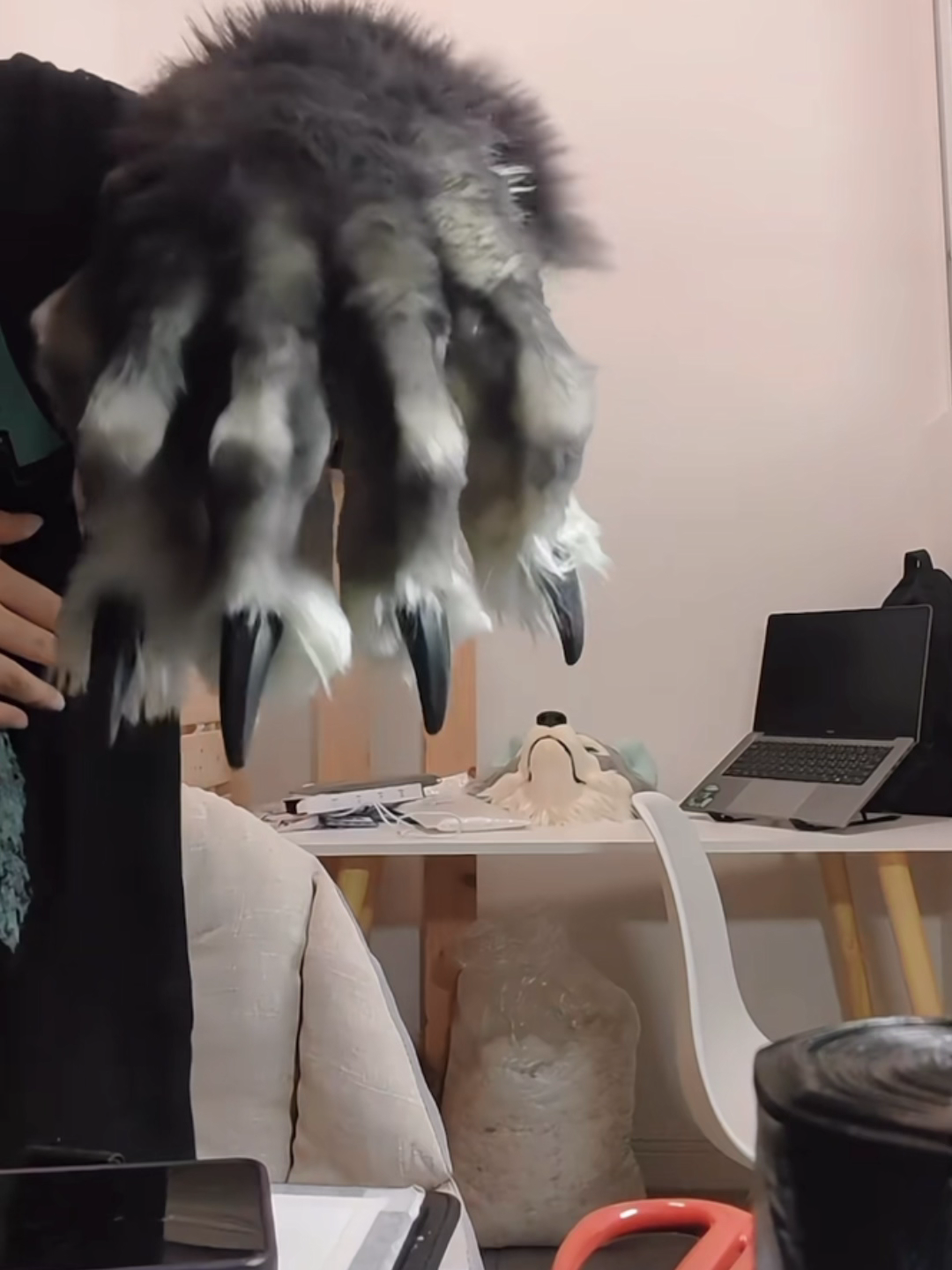 black large paw fursuit paws with arm sleeves, featuring a 3D printed support inside, customizable colors.